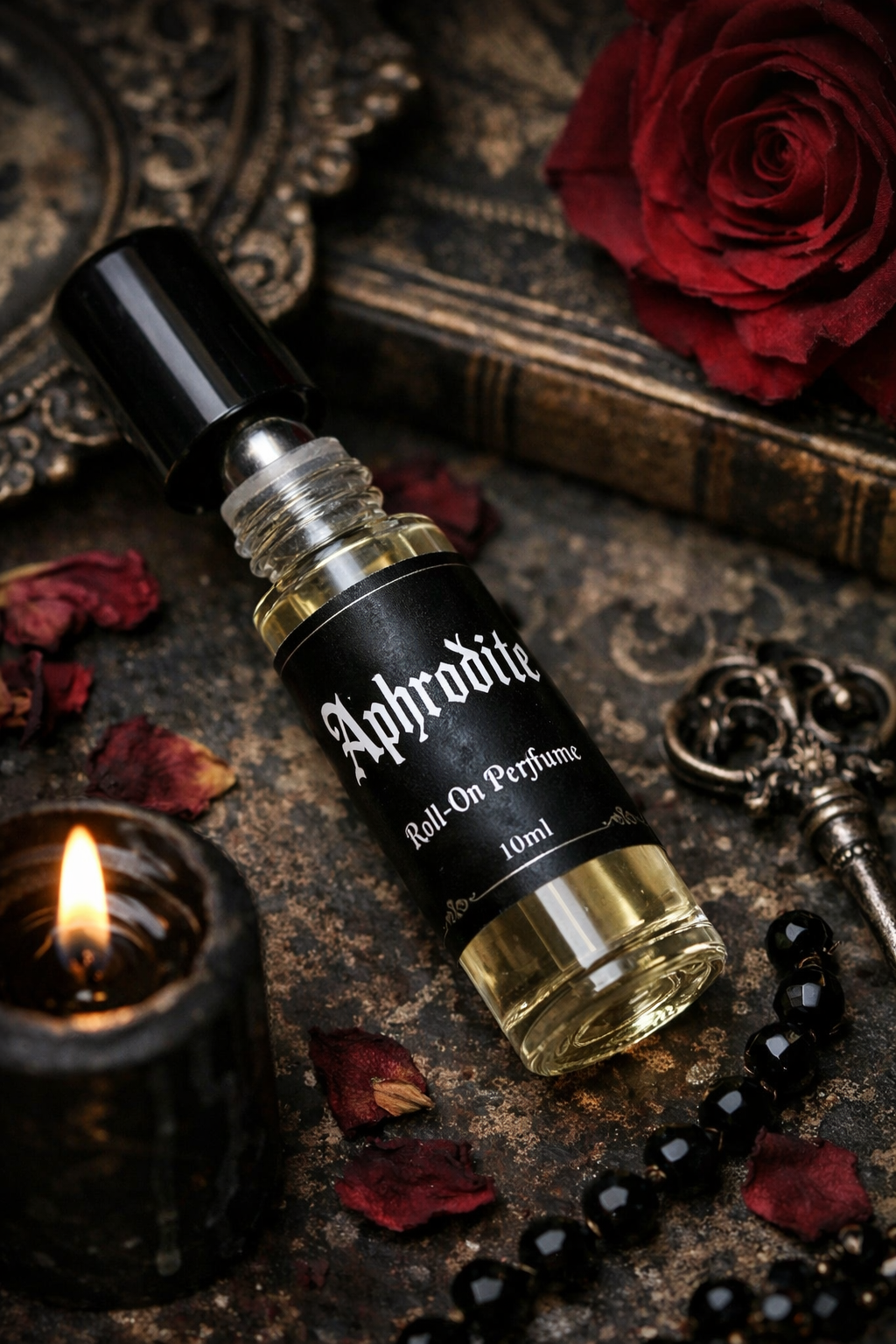 perfume oil, roll on perfume, roll on fragrance, natural perfume, fragrance oil, oil perfume, Aphrodite perfume, goddess perfume, romantic perfume, gothic perfume, dark romance perfume, old world perfume, occult perfume, witchy perfume, apothecary perfume, gothic aesthetic, gothic beauty, dark feminine, victorian gothic, romantic goth, antique styling, gothic product photography, moody product photography, valentine gift idea, anniversary gift, self love gift, perfume gift, artisan perfume gift, botanical p