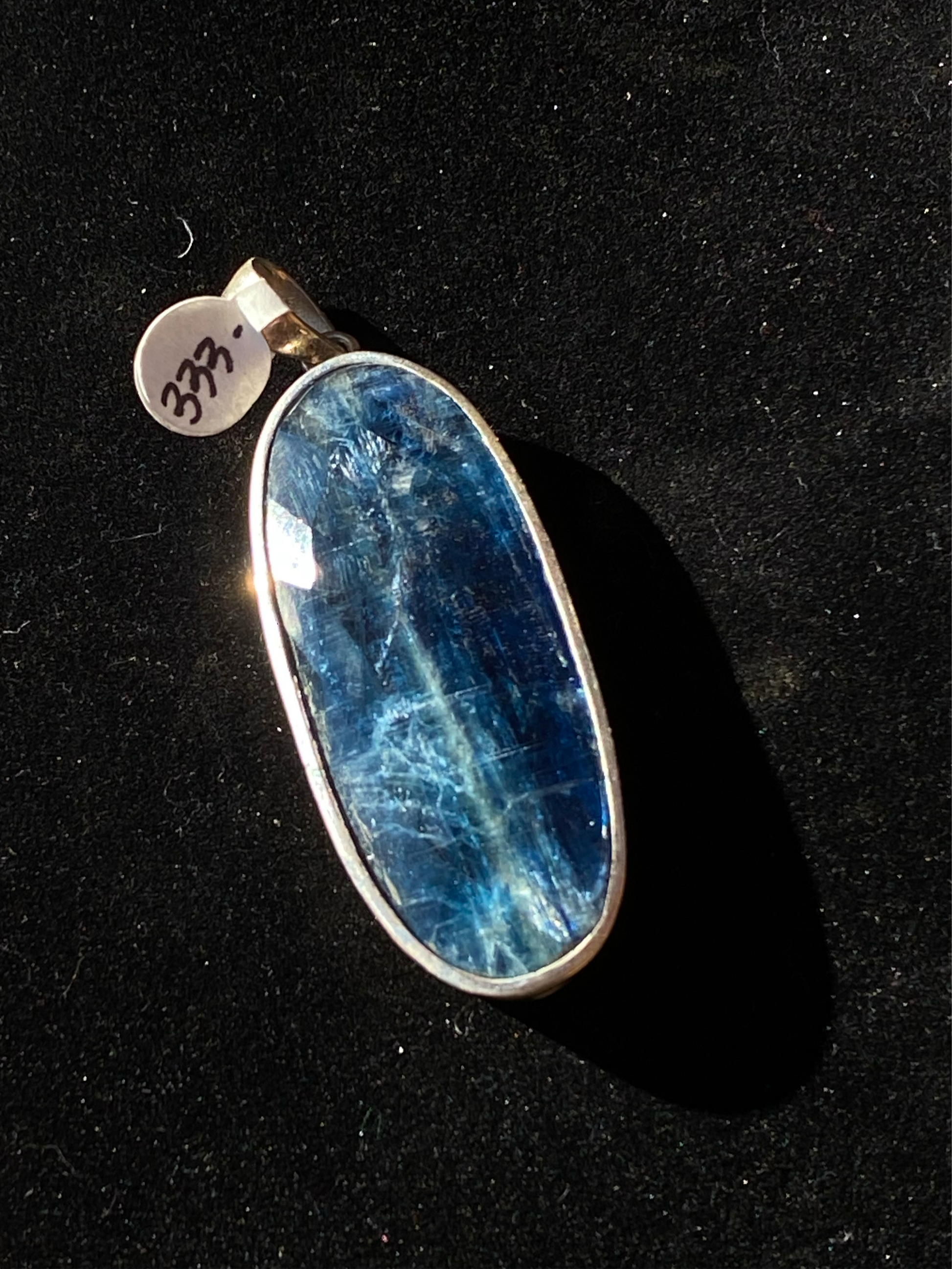 Rare blue kyanite pendant, kyanite gemstone jewelry, sterling silver kyanite necklace, natural blue kyanite charm, statement gemstone pendant, healing kyanite crystal necklace, blue kyanite for throat chakra, artisan kyanite pendant, high-vibration kyanite jewelry, unique gemstone necklace, bohemian kyanite pendant, rare crystal jewelry, kyanite energy necklace, handcrafted blue kyanite pendant, spiritual gemstone charm