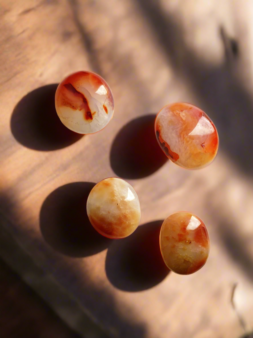 Carnelian palm stone for creativity and courage