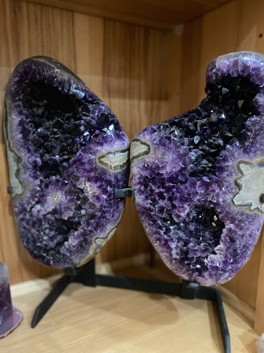 Huge amethyst angel wings, large purple crystal angel wings, natural amethyst sculpture, hand-carved amethyst wings, spiritual home decor, crystal healing decor, meditation crystal wings, Reiki energy decor, chakra healing amethyst, metaphysical decor, unique amethyst angel gift, purple gemstone wings, altar centerpiece, spiritual crystal home decoration, angel wing sculpture for meditation, positive energy home decor, handcrafted amethyst angel wings, crystal collector decor, amethyst wings for sa
