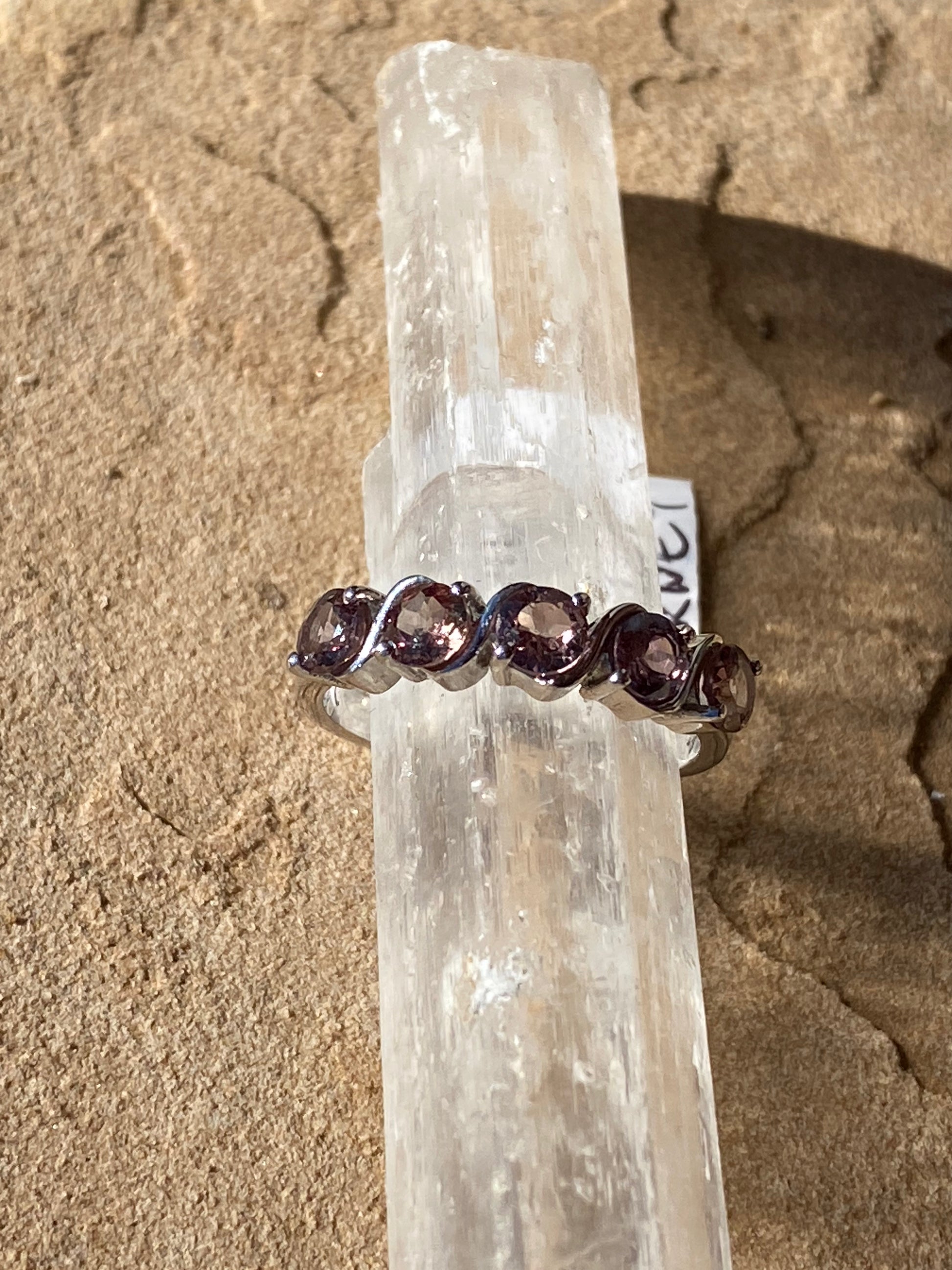 Color-changing garnet ring, garnet gemstone ring, transformative gemstone jewelry, sterling silver garnet ring, unique garnet statement ring, garnet crystal jewelry, mood-changing garnet ring, handcrafted gemstone ring, garnet for energy balance, natural gemstone ring, bohemian garnet jewelry, garnet birthstone ring, adjustable garnet ring, mystical garnet jewelry, sterling silver statement ring