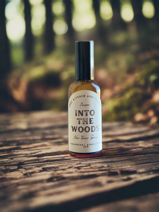 Into the Woods spray styled in cozy bedroom setting